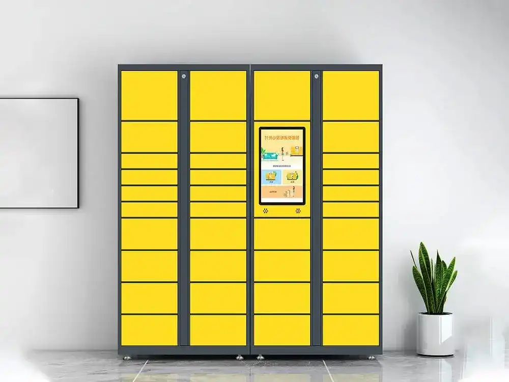 A bright yellow intelligent storage locker system with a central touchscreen kiosk, used for automated parcel pickup and secure package management in smart cities.